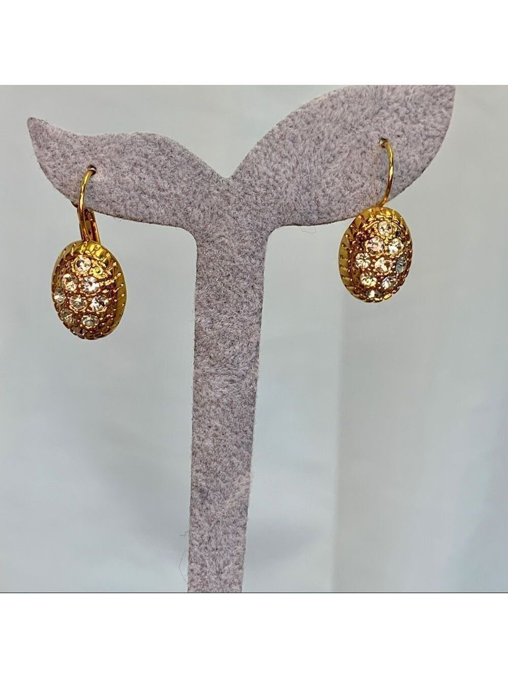 Gold dangling rhinestone embellished earrings